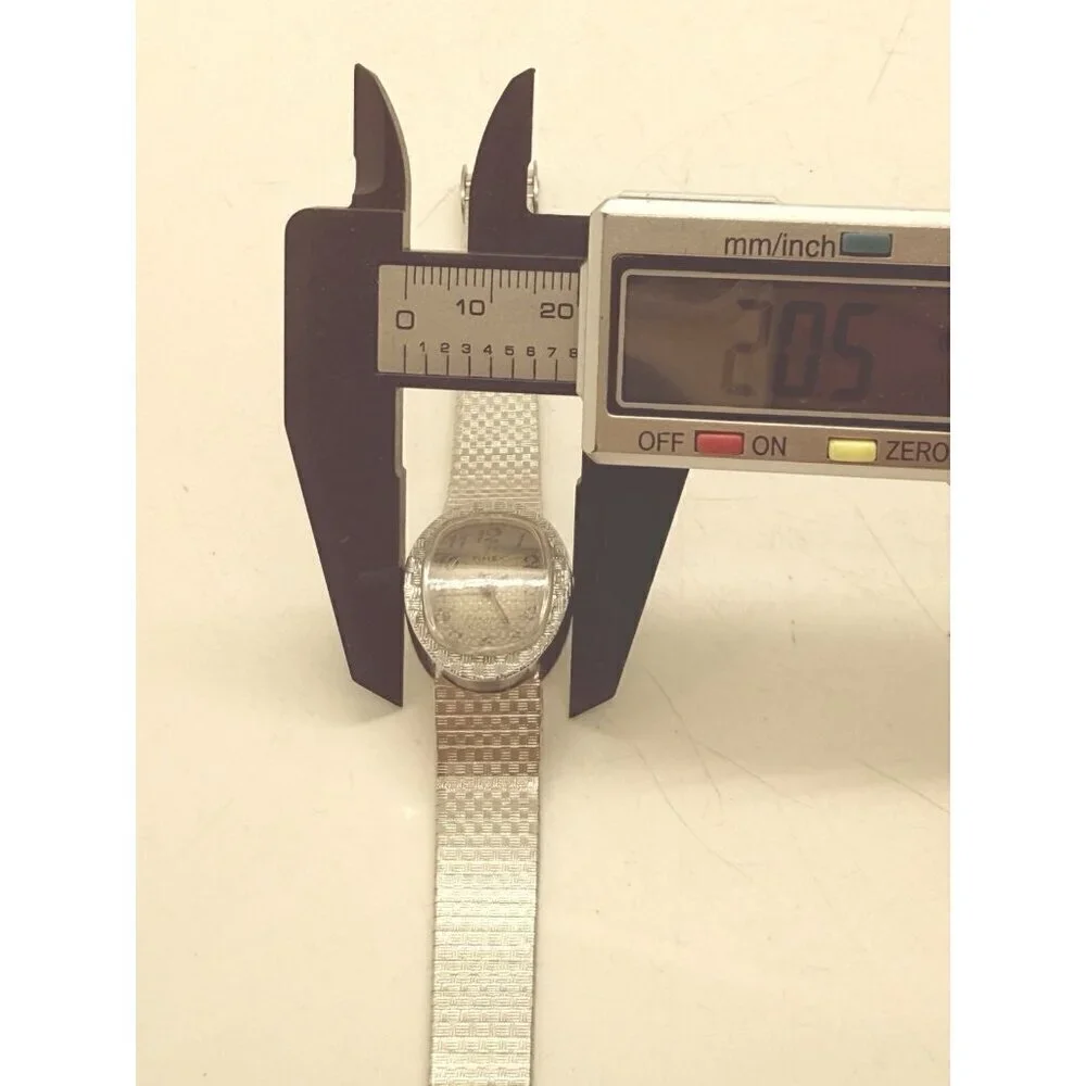 Vintage Women's Timex Electric Silver Tone Oval Watch Stainless Steel Bracelet